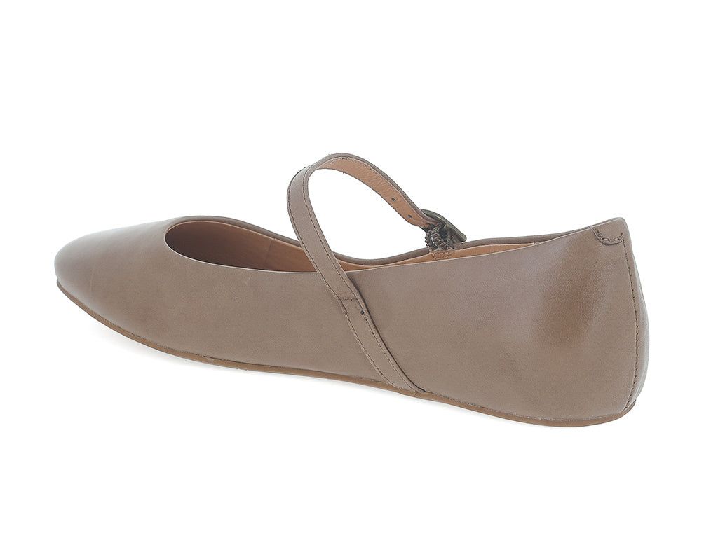 Taupe leather rounded toe flat with over the instep buckle strap on a white background side angle view