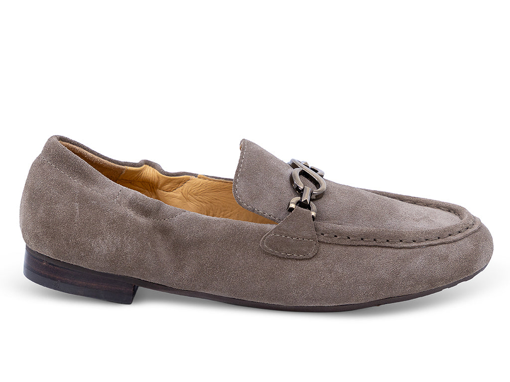 A taupe brown suede loafer with a decorative metal horsebit detail across the vamp - lateral side view
