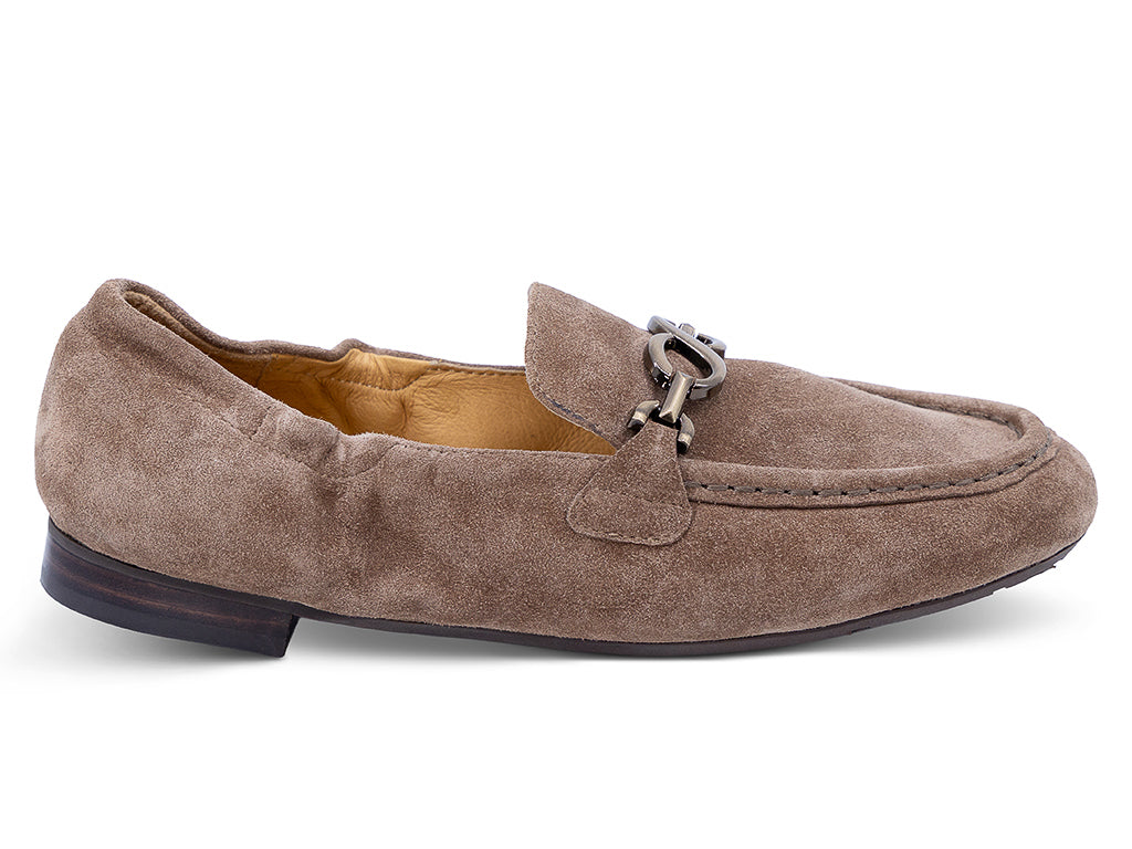 A toffee suede loafer with a decorative metal horsebit detail across the vamp - lateral side view
