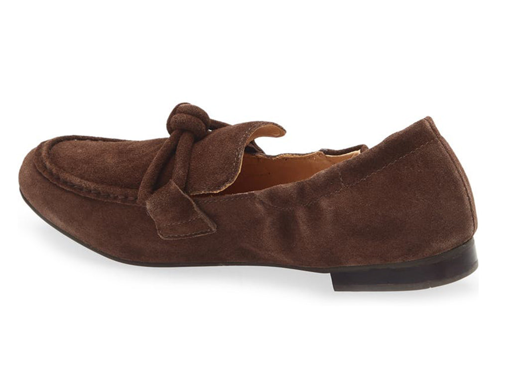 Chocolate suede rounded toe flat with decorative cord design and elasticized sides on a white background side angle view