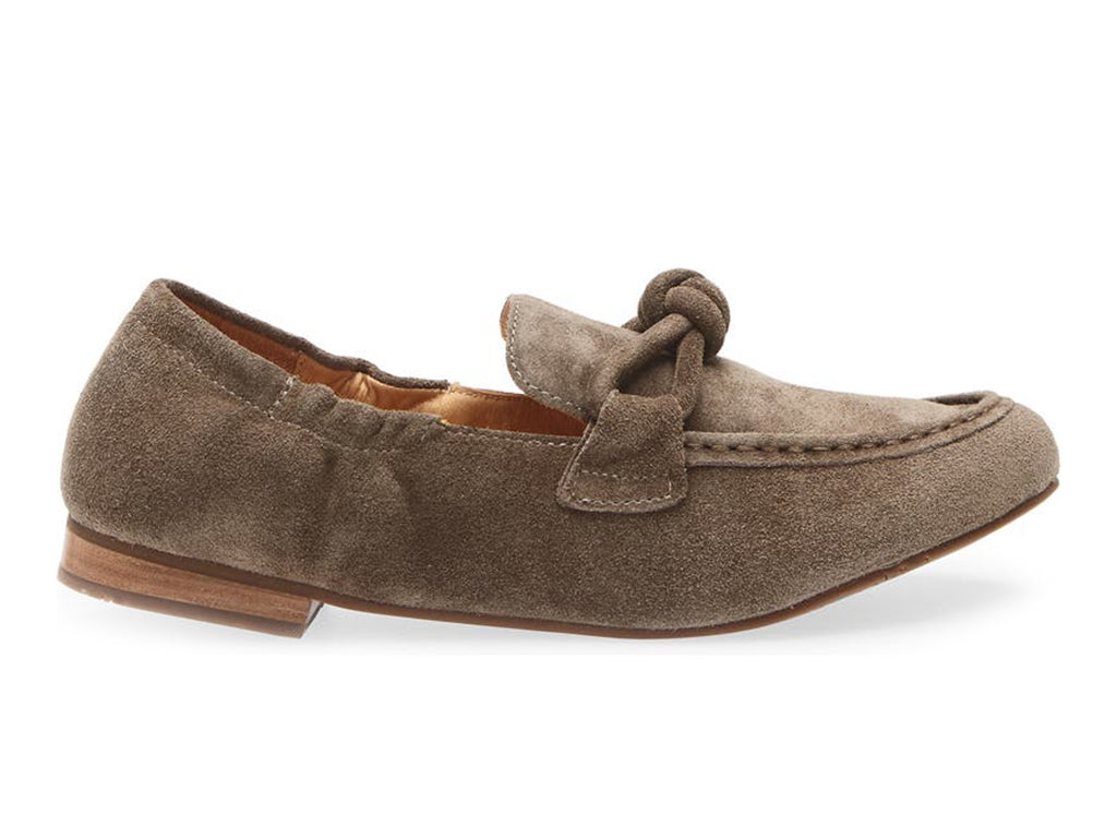 Dark tauoe suede rounded toe flat with decorative cord design and elasticized sides on a white background side  view