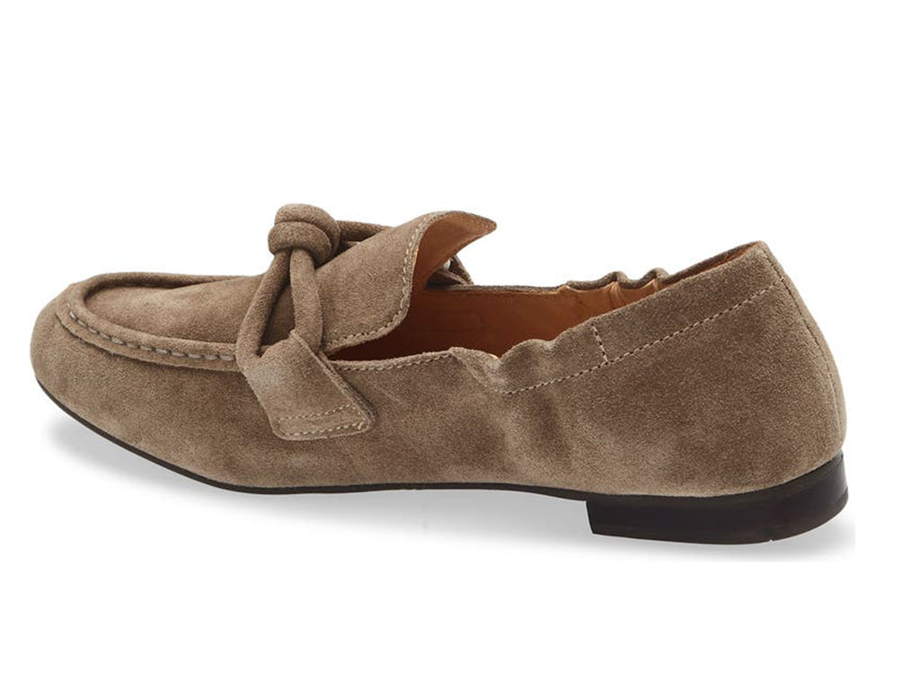 Toffee suede rounded toe flat with decorative cord design and elasticized sides on a white background side angle view