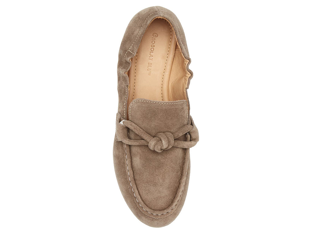Toffee suede rounded toe flat with decorative cord design and elasticized sides on a white background top view