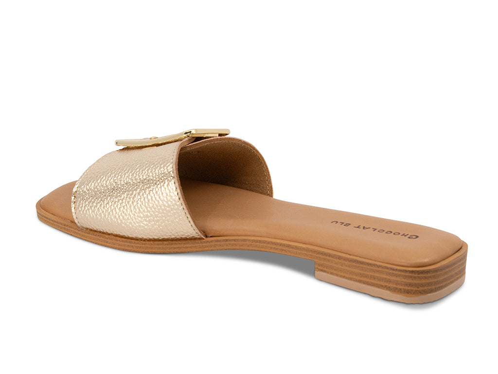 gold sandal on a low heel - view of side from the back