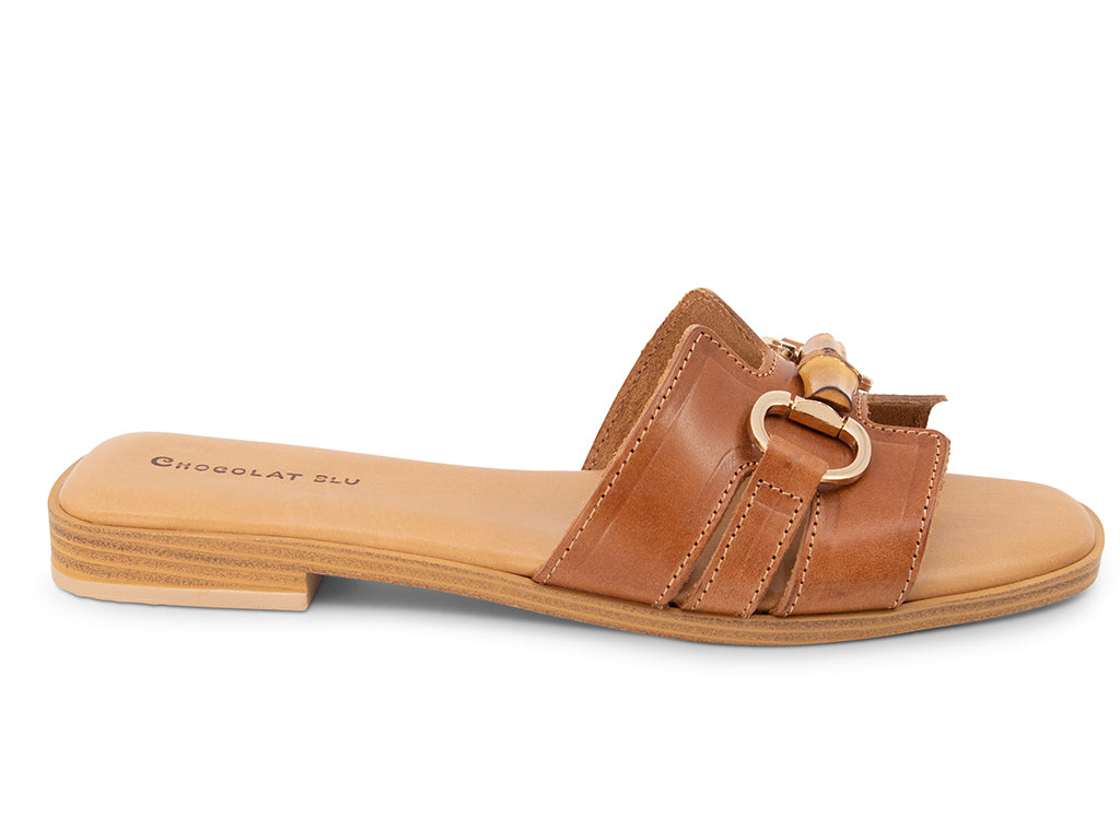 brown sandal with bamboo toggle on a low heel - side view