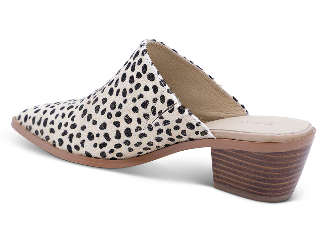 a pointed toe mule with calf hair gold dotted upper and stacked block heel -  view of the side from the back