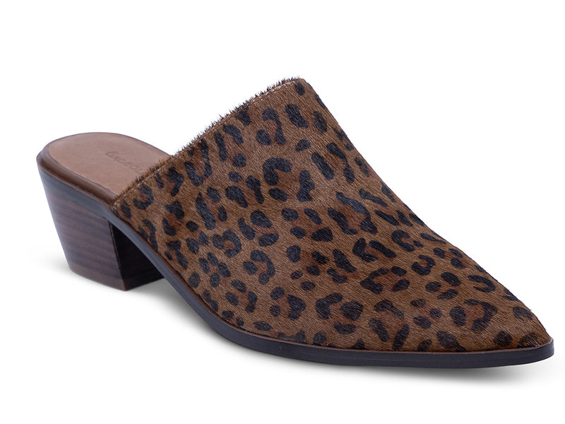 a pointed toe mule with leopard pattern calf hair upper and stacked block heel - front view