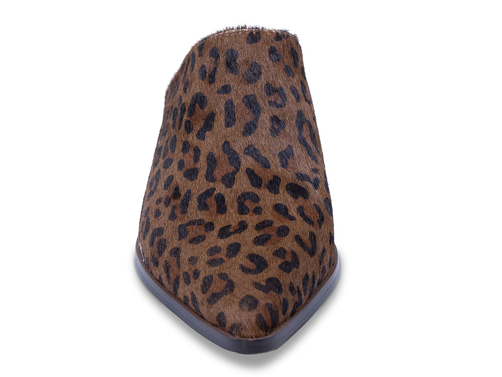 a pointed toe mule with leopard pattern calf hair upper and stacked block heel - front view of the toe shape and upper