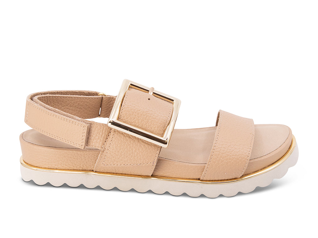 cream sandal with ankle strap and gold buckle - side view