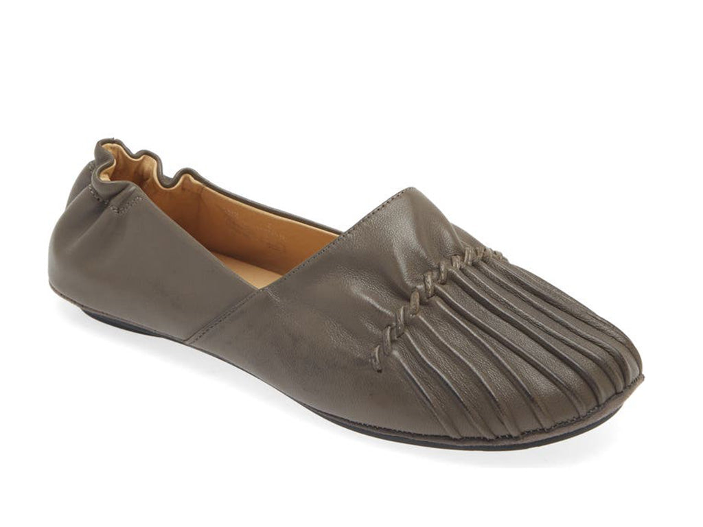 Grey leather rounded toe flat with ruched design and elasticized back on a white background side angle view