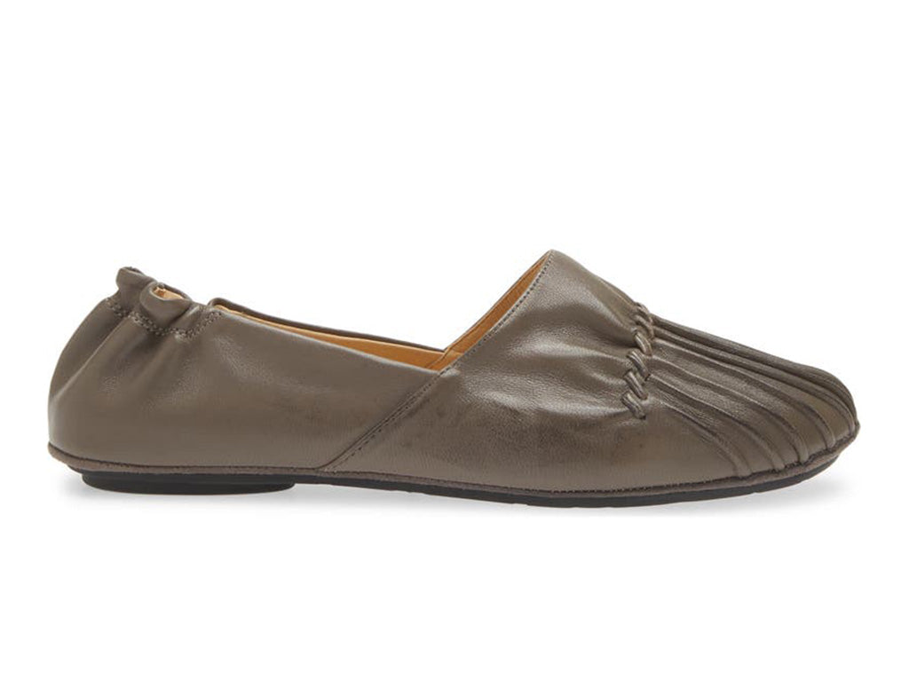 Grey leather rounded toe flat with ruched design and elasticized back on a white background side view