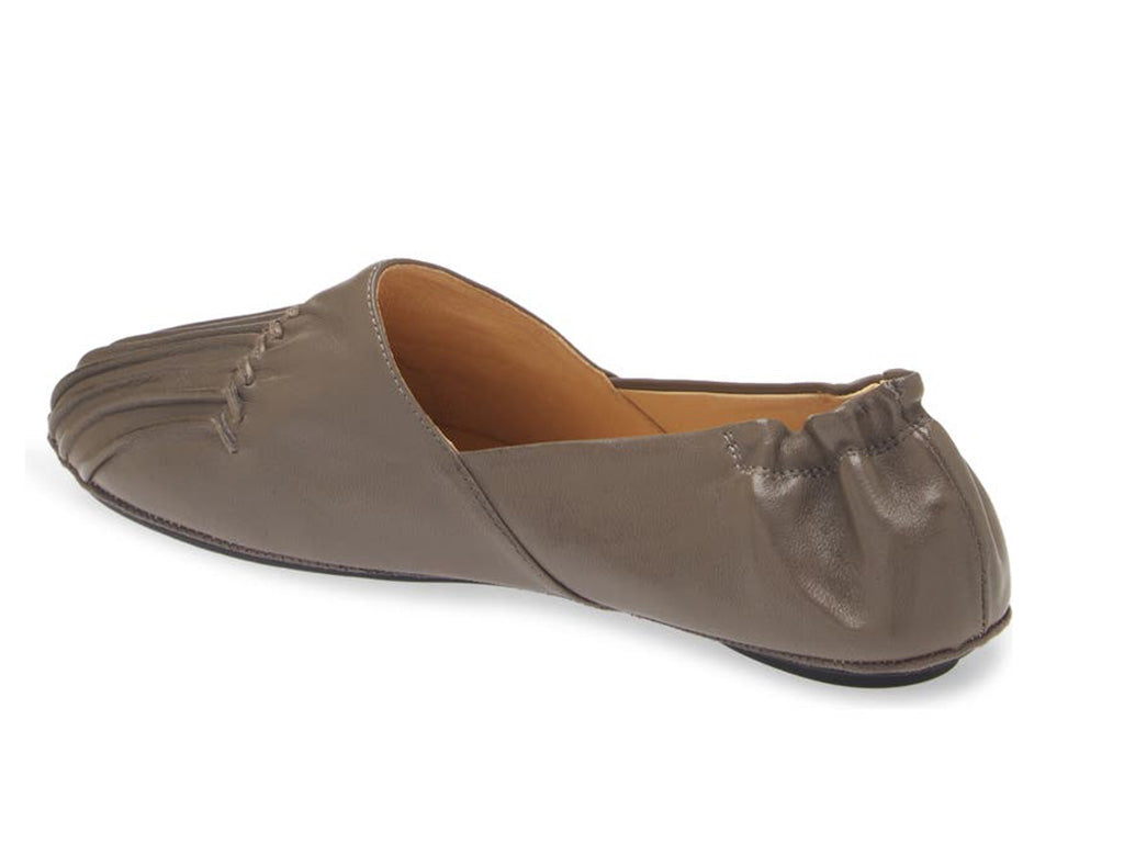 Grey leather rounded toe flat with ruched design and elasticized back on a white background side angle view