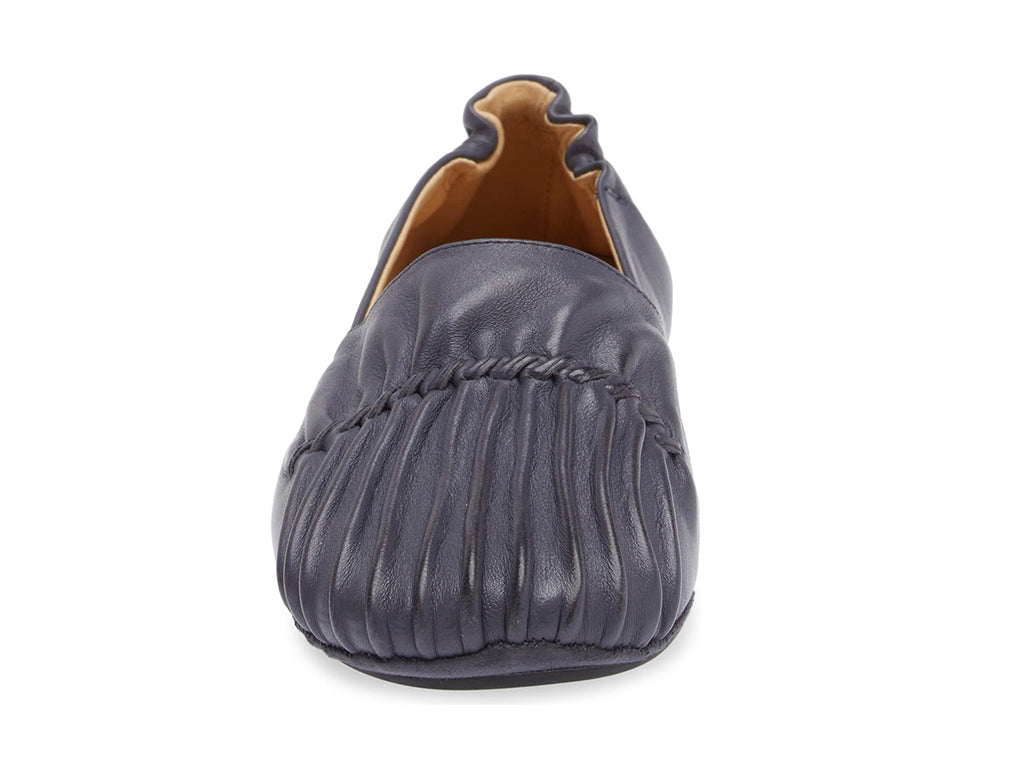 Navy leather rounded toe flat with ruched design and elasticized back on a white background front view