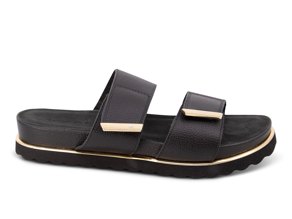black sandal with black track sole and gold accents - side view