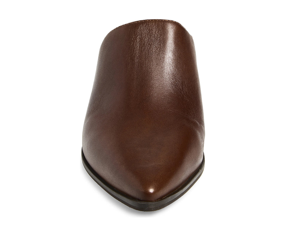 A dark brown leather pointed-toe mule  with a stacked block heel - front view