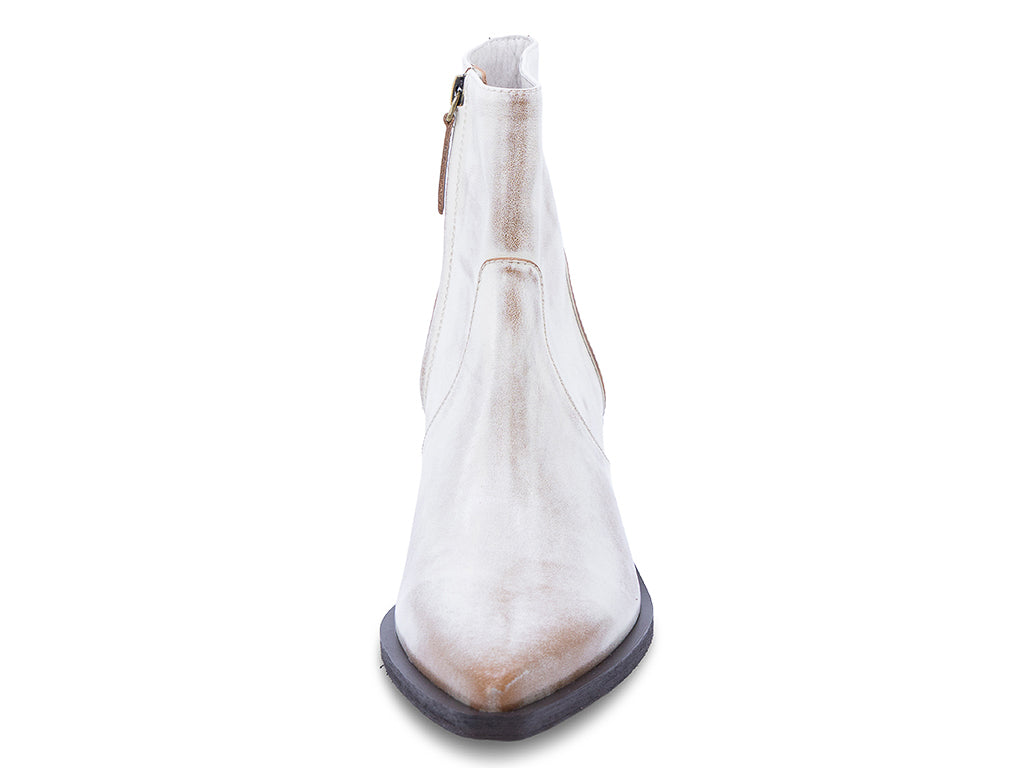 A vintage white leather ankle boot with a pointed toe and a low block heel - front view