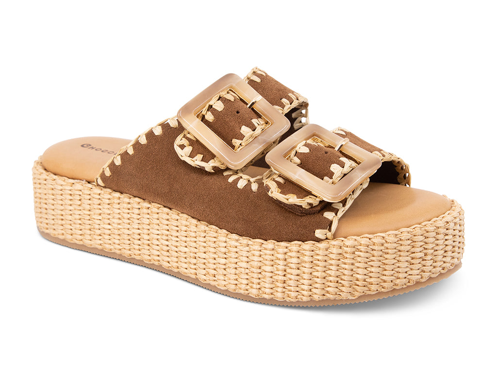 brown suede upper sandal with buckles on a raffia wrapped platform