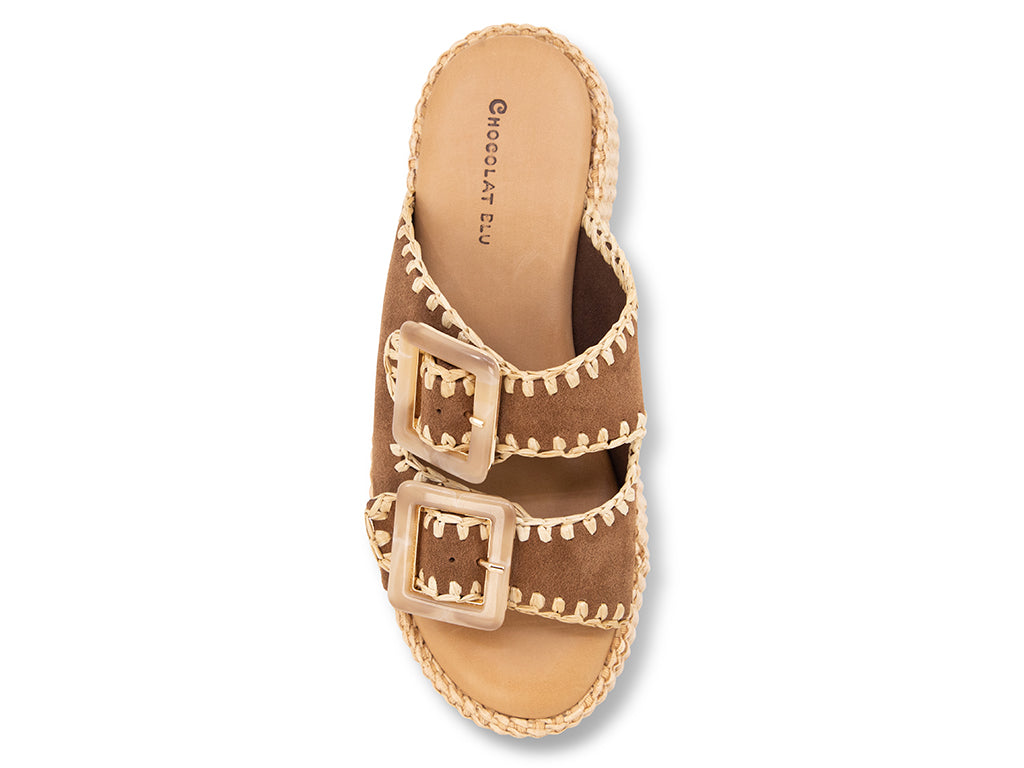 brown suede upper sandal with buckles on a raffia wrapped platform - top view