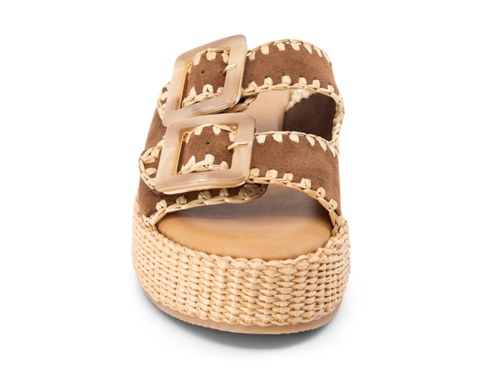 brown suede upper sandal with buckles on a raffia wrapped platform - front view