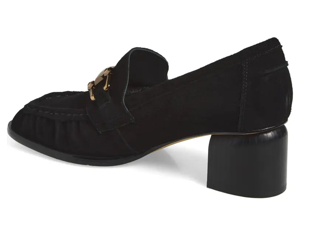 A black suede penny loafer with a block heel and a polished gold-tone horsebit detail across the vamp - inner side view