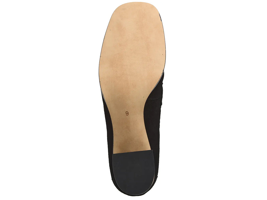 A black suede penny loafer with a block heel and a polished gold-tone horsebit detail across the vamp - outsole view