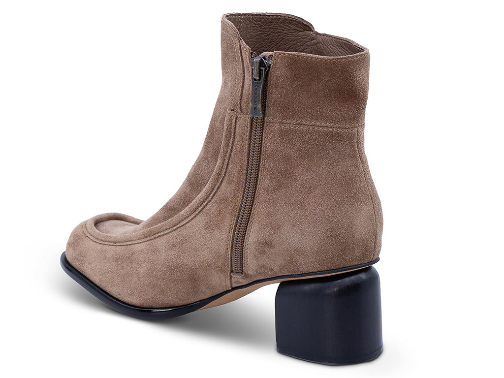 a toffee suede upper ankle bootie with block heel - medial view of side and the zipper