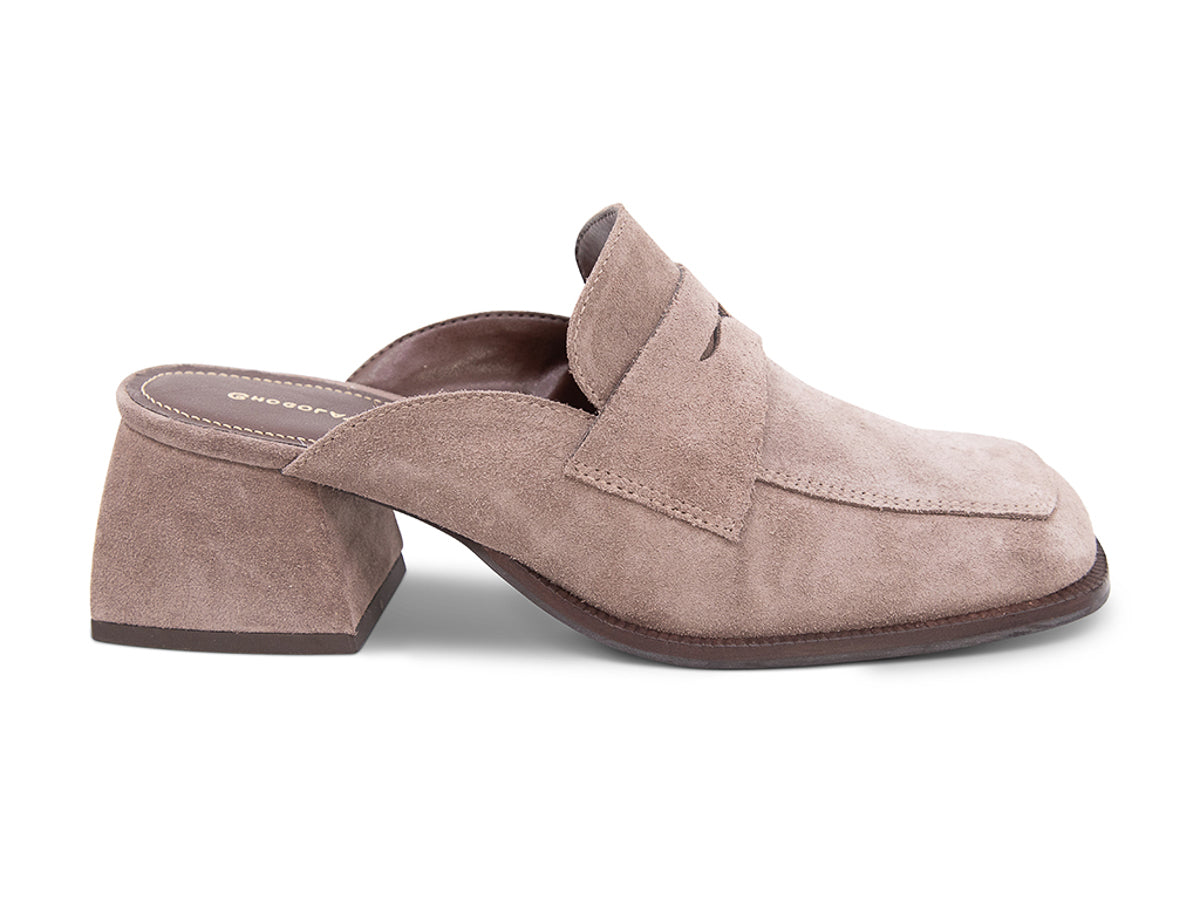 Fog (light grey) suede slide shoe with a block heel and penny loafer design on a white background side view