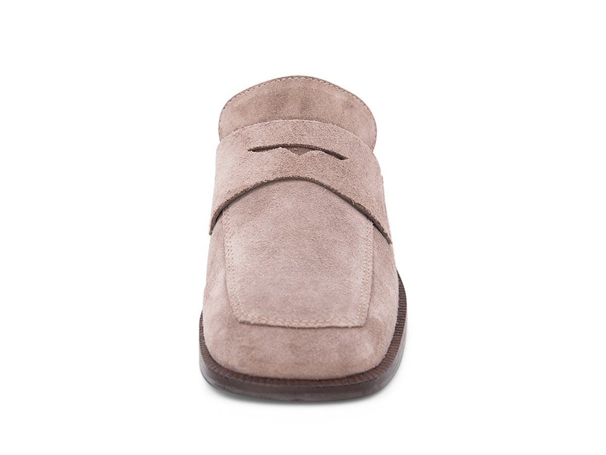 Fog (light grey) suede slide shoe with a block heel and penny loafer design on a white background front view