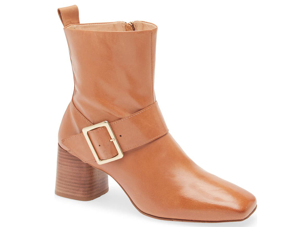 Camel ankle heeled boot with gold buckle on a white background side angle view