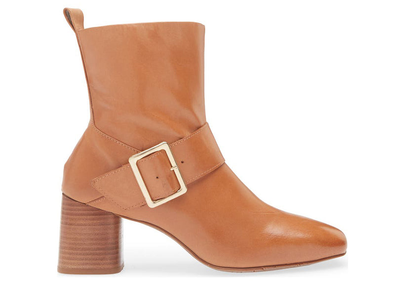 Camel ankle heeled boot with gold buckle on a white background side view