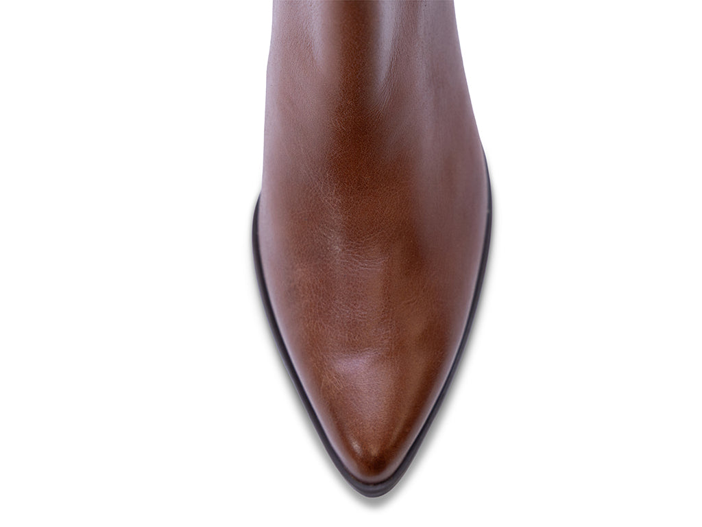 brown leather ankle bootie with studs and a block heel -view of the toe shape