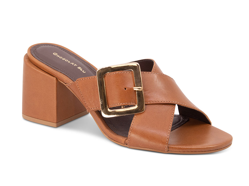 brown crisscross sandal with a buckle and a block heel