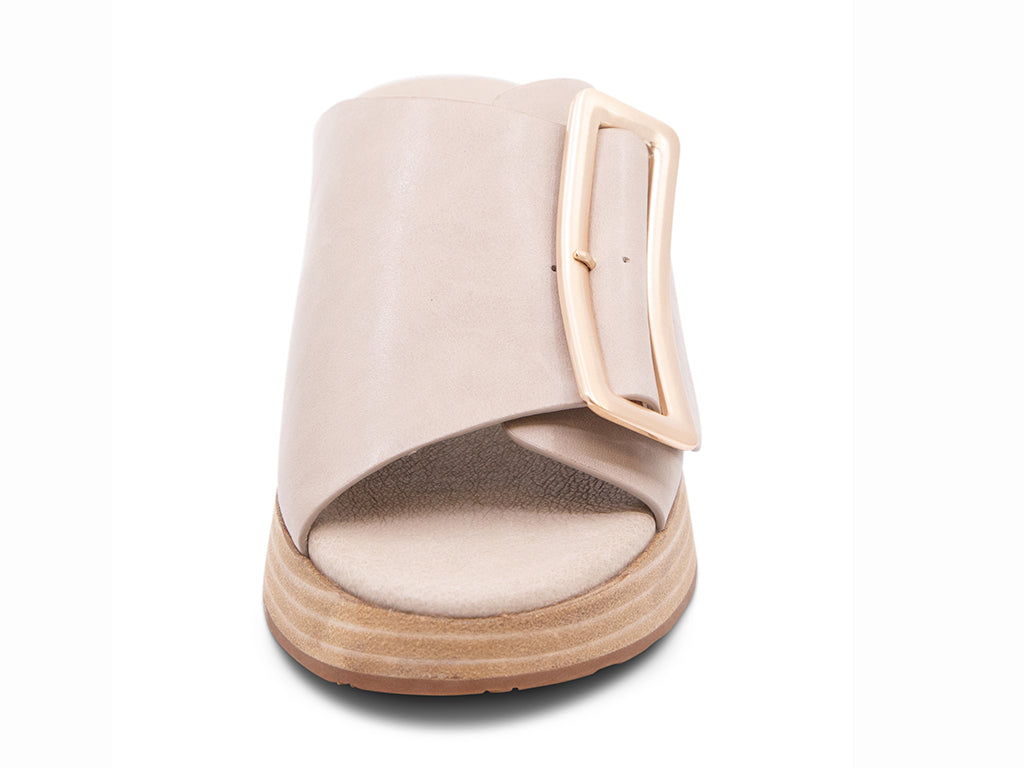 beige wedge slide sandal with an oversized gold buckle - front view