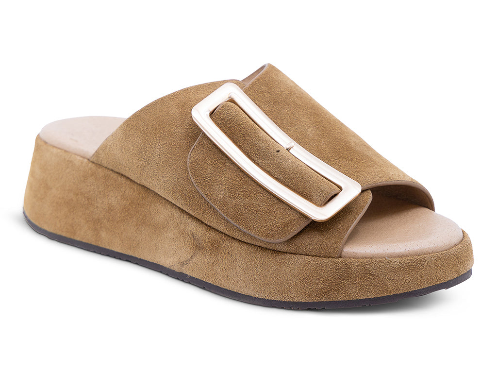 a camel suede wedge slide sandal with a wide strap and an oversized buckle - front 3/4 view