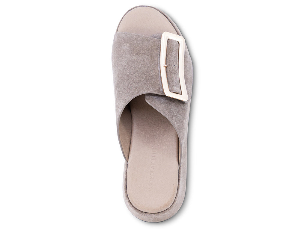 a dark taupe suede wedge slide sandal with a wide strap and an oversized buckle - top view
