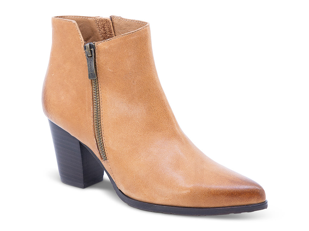 A caramel leather ankle boot with a side zipper and a dark block heel - front 3/4 view