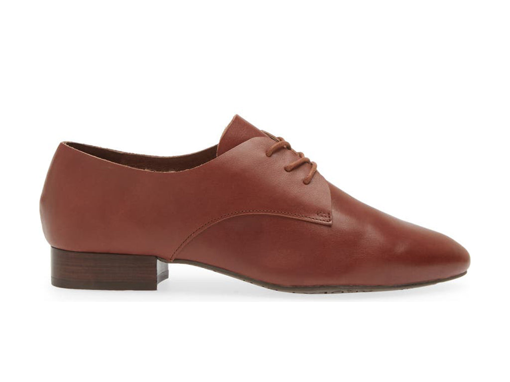 Brown leather lace-up pointed toe flat with mini block heel on a white background side view