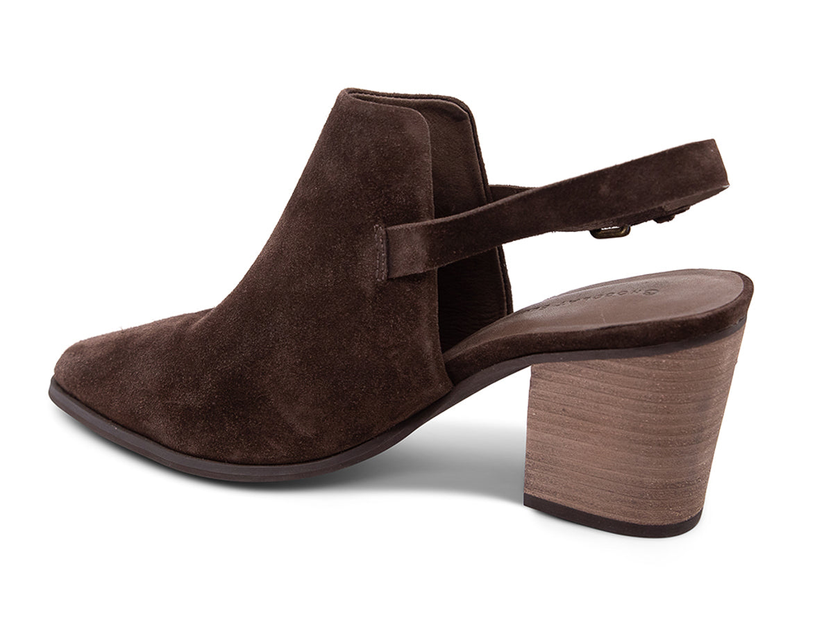 Brown suede pointed toe shoe with wooden block heel and buckle ankle back strap on a white background side angle view