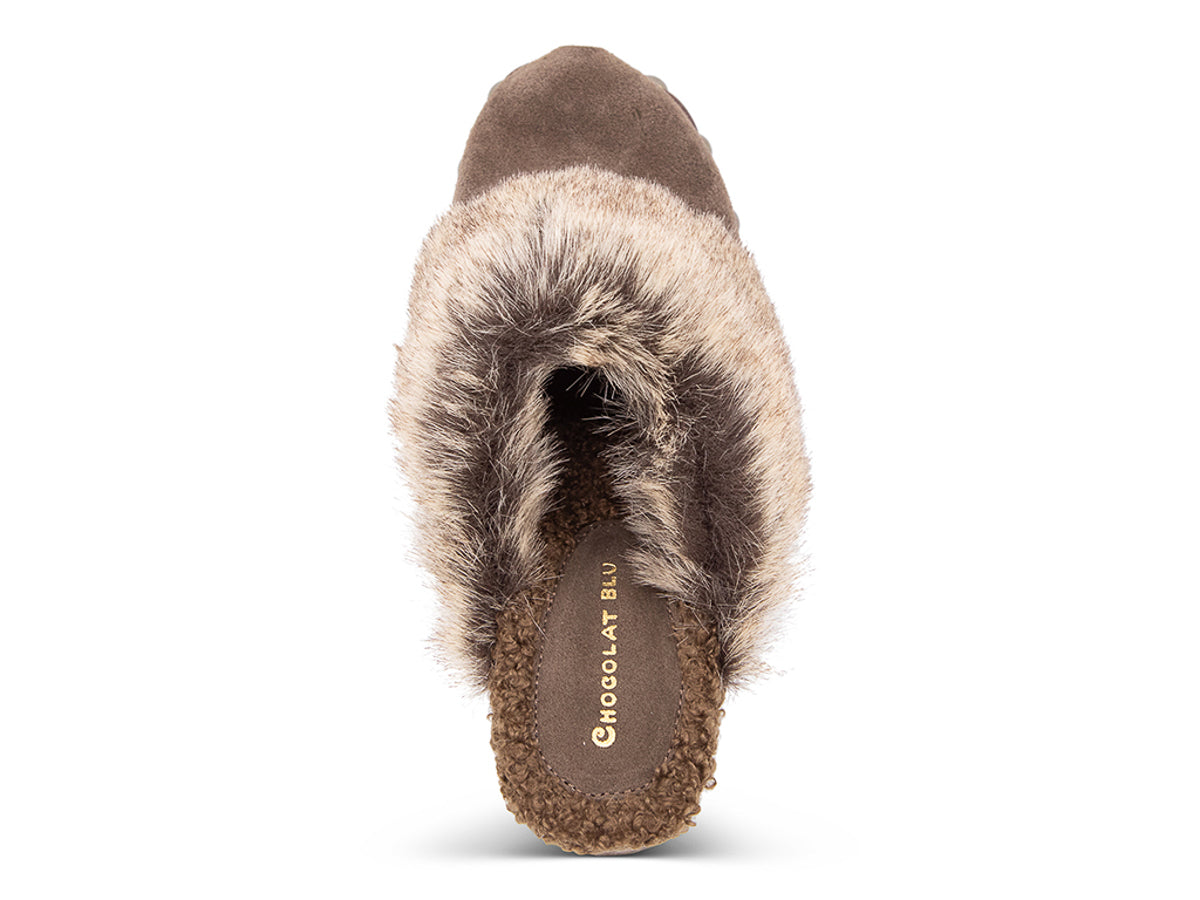 Brown heeled clog shoe with fur trim and grommet studs  on a white background top view