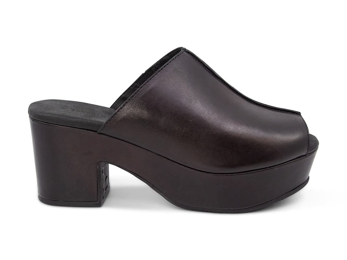 Black leather platform wedge peep-toe boot on a block heel with exposed seam design on upper on a white background side view