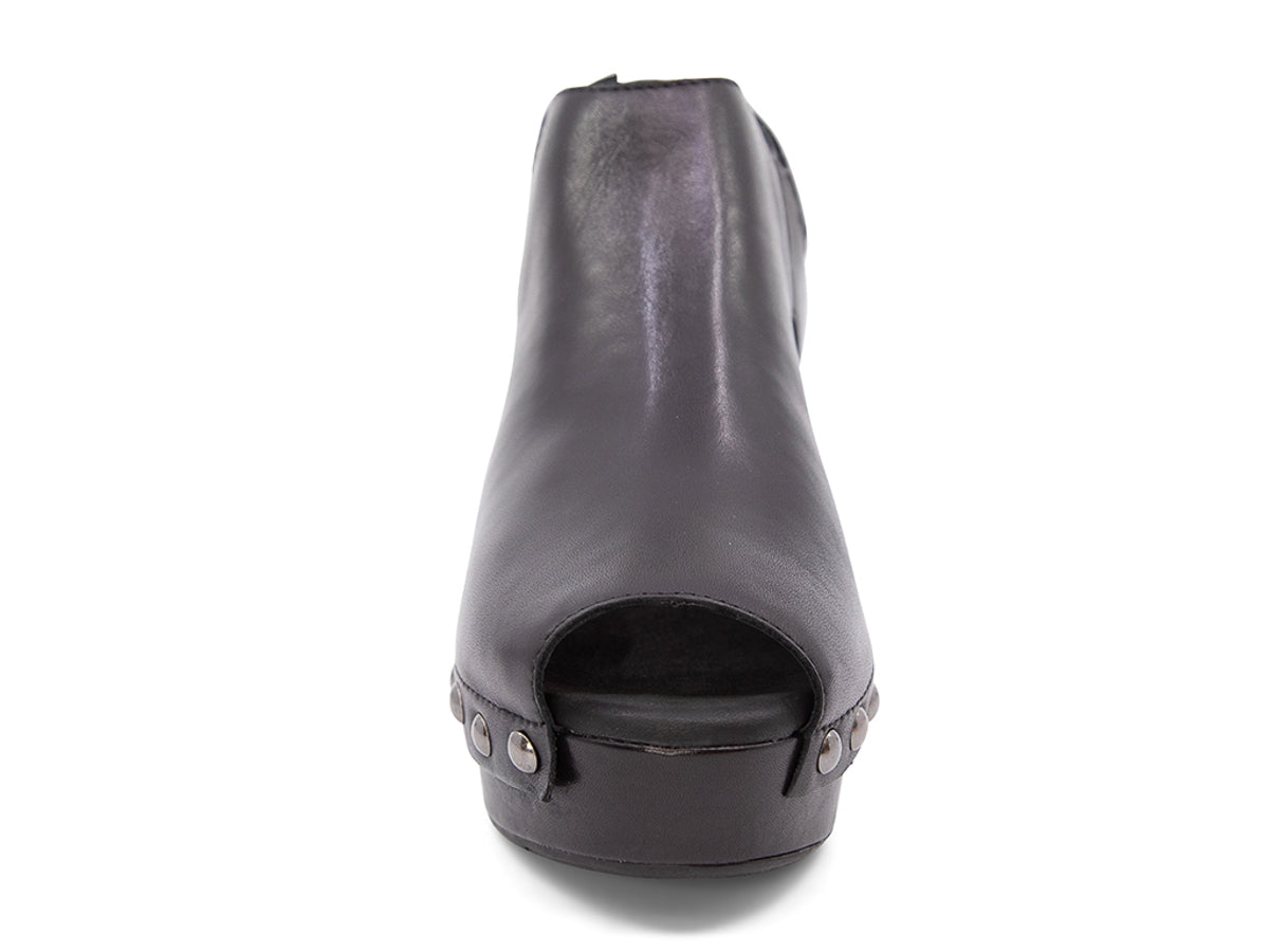 Black leather clog peep toe shoe with a block heel and grommet studs on a white background front view
