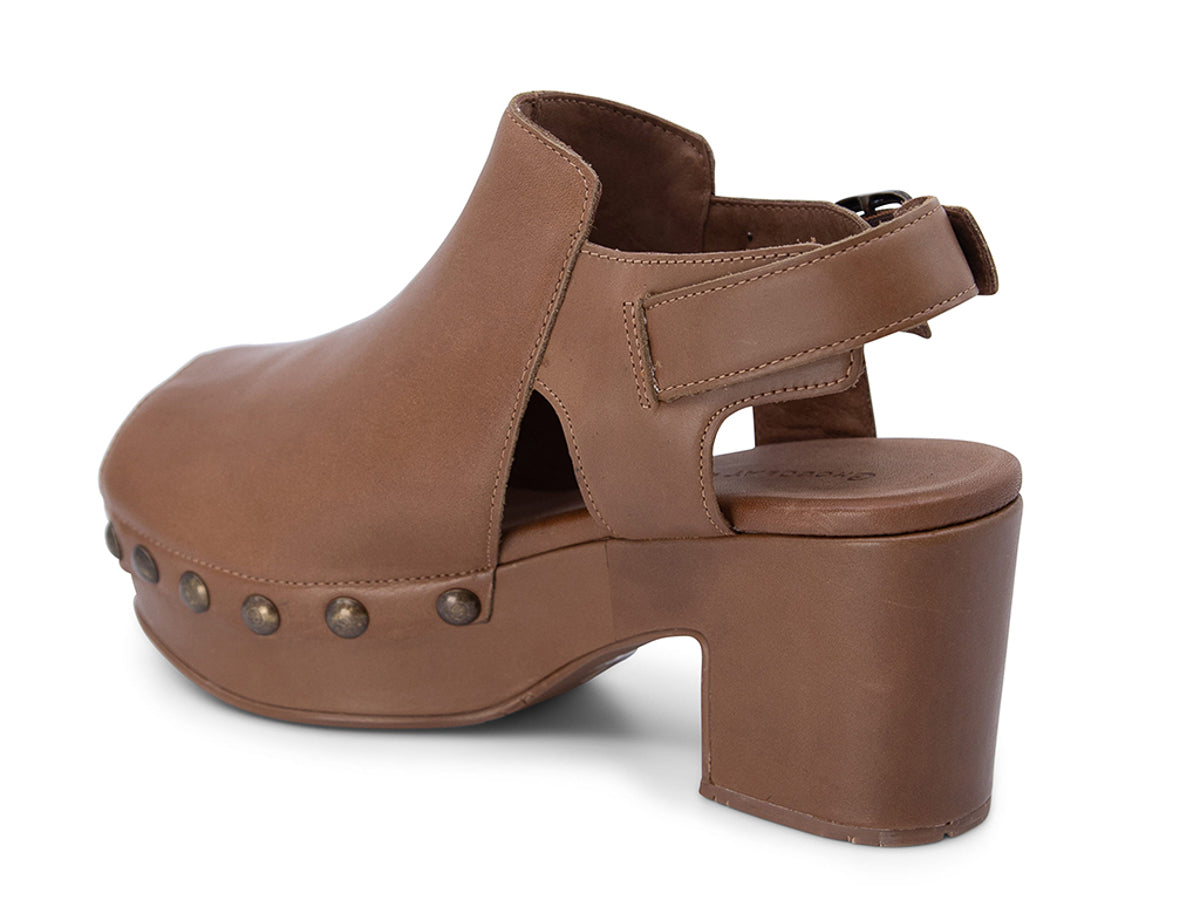 Brown leather clog peep toe shoe with a block heel and grommet studs on a white background side angle view