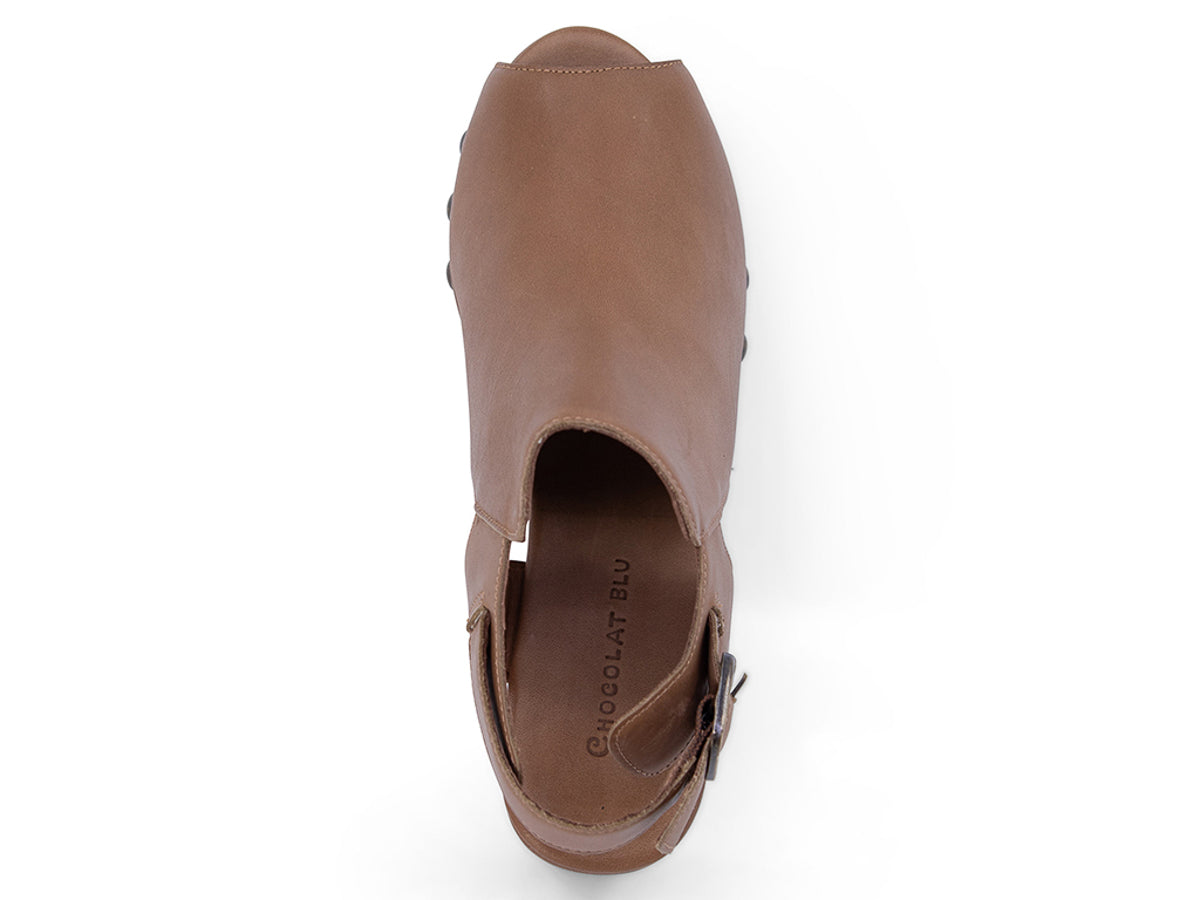 Brown leather clog peep toe shoe with a block heel and grommet studs on a white background top view