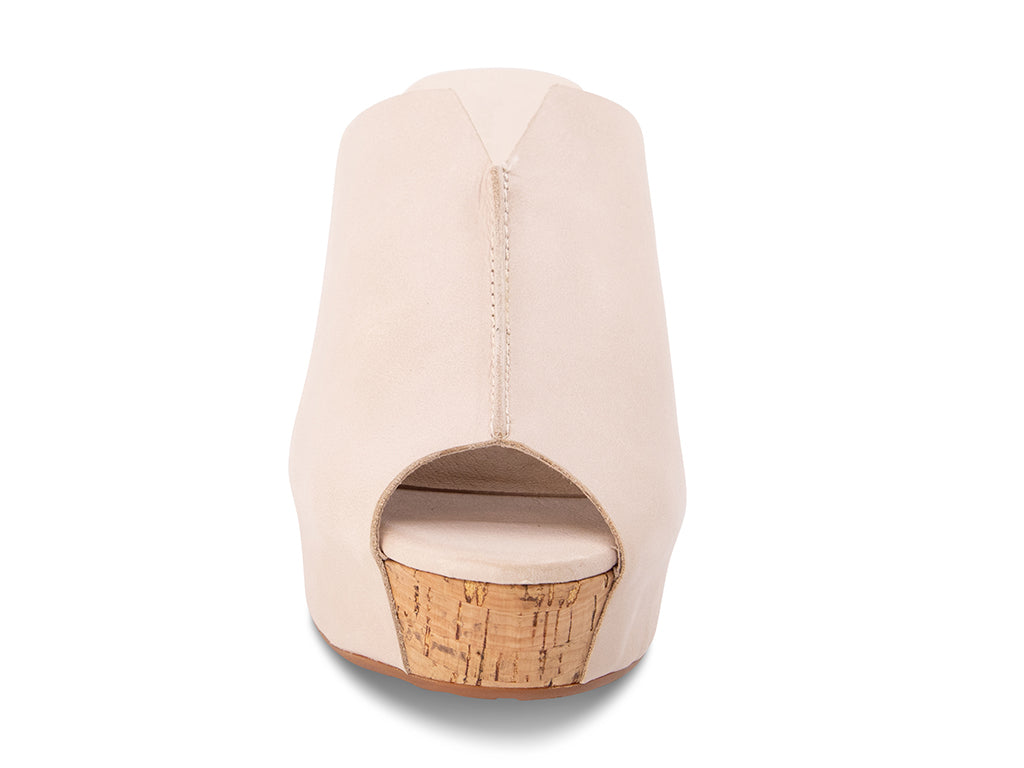 beige open-toe clog shoe with cork platform sole - front view