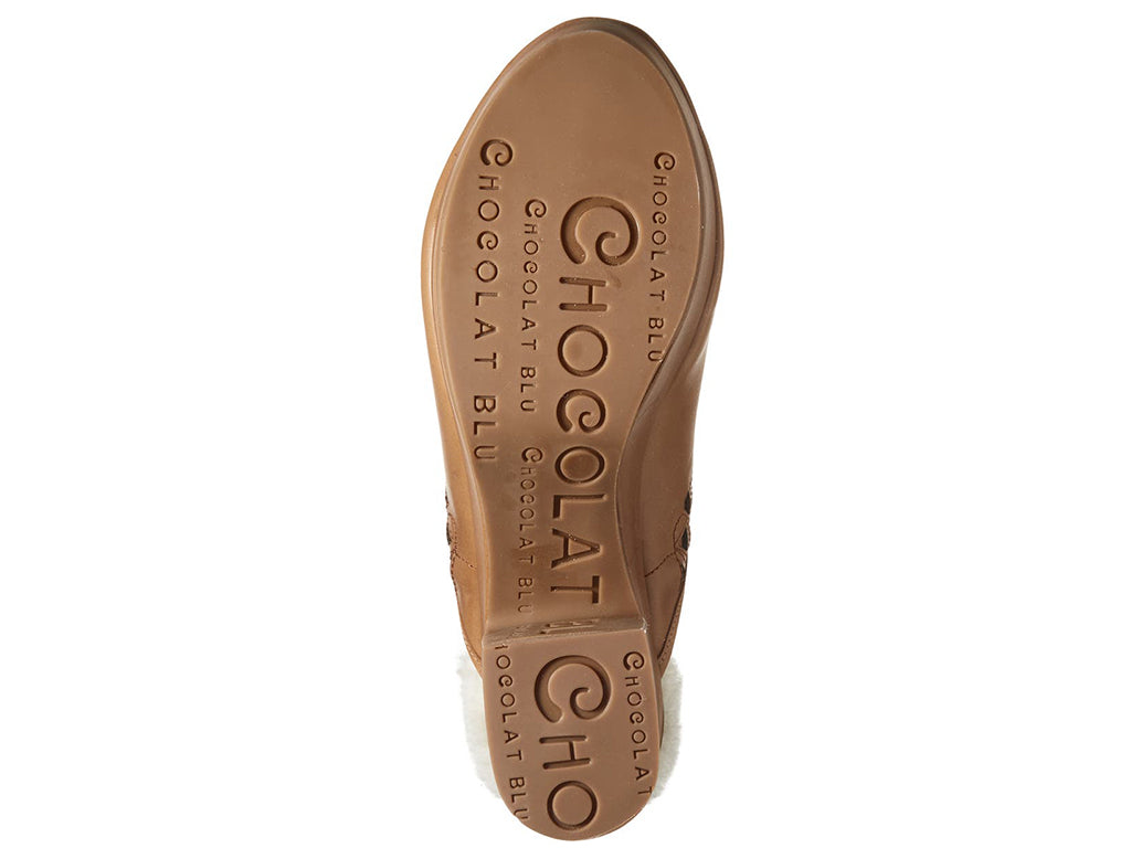 Brown heeled clog shoe with fur trim mid sole on a white background bottom sole view