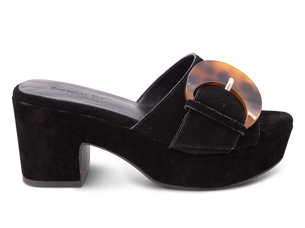 Black suede platform sandal with tortoiseshell buckle on a platform with block heel - side view
