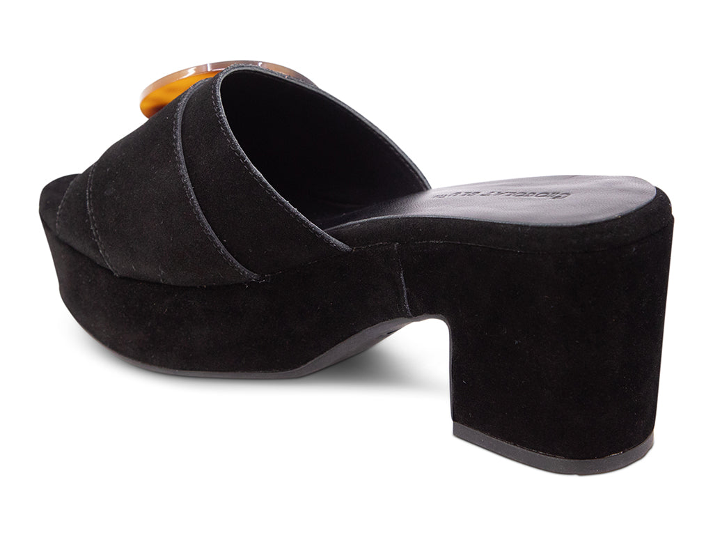 Black suede platform sandal with tortoiseshell buckle on a platform with block heel - back angle view