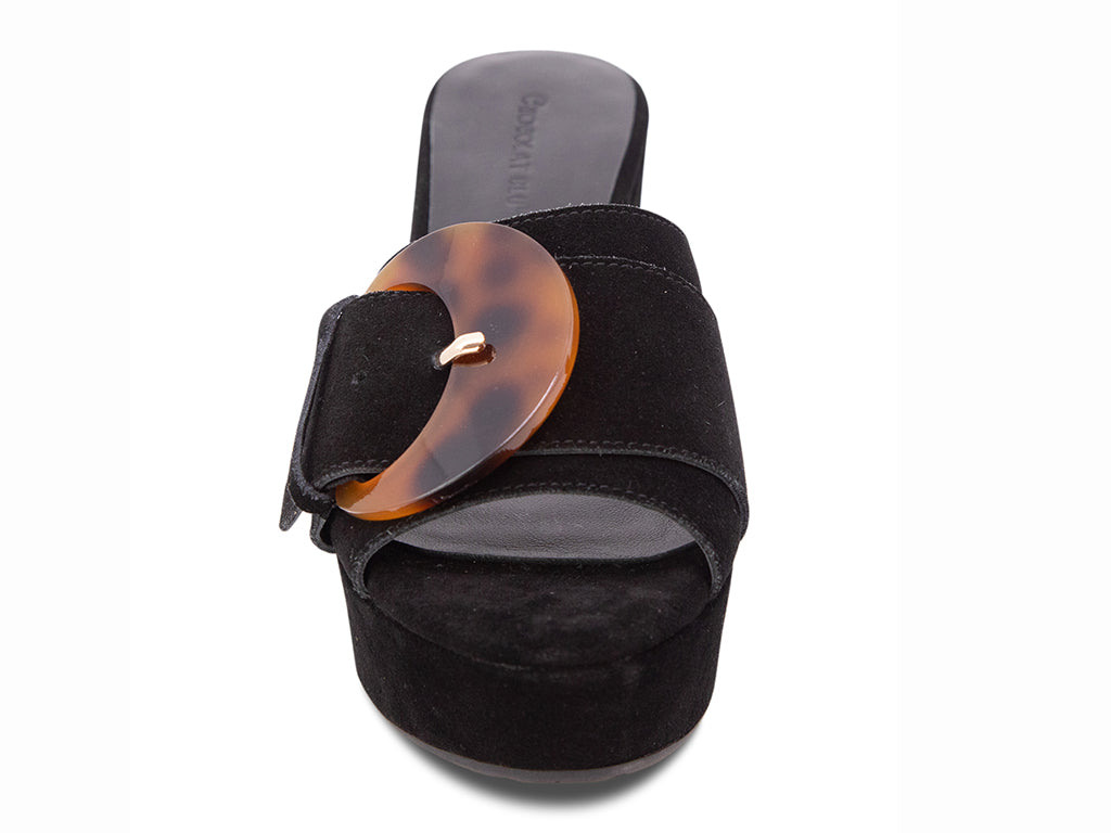 Black suede platform sandal with tortoiseshell buckle on a platform with block heel - front view