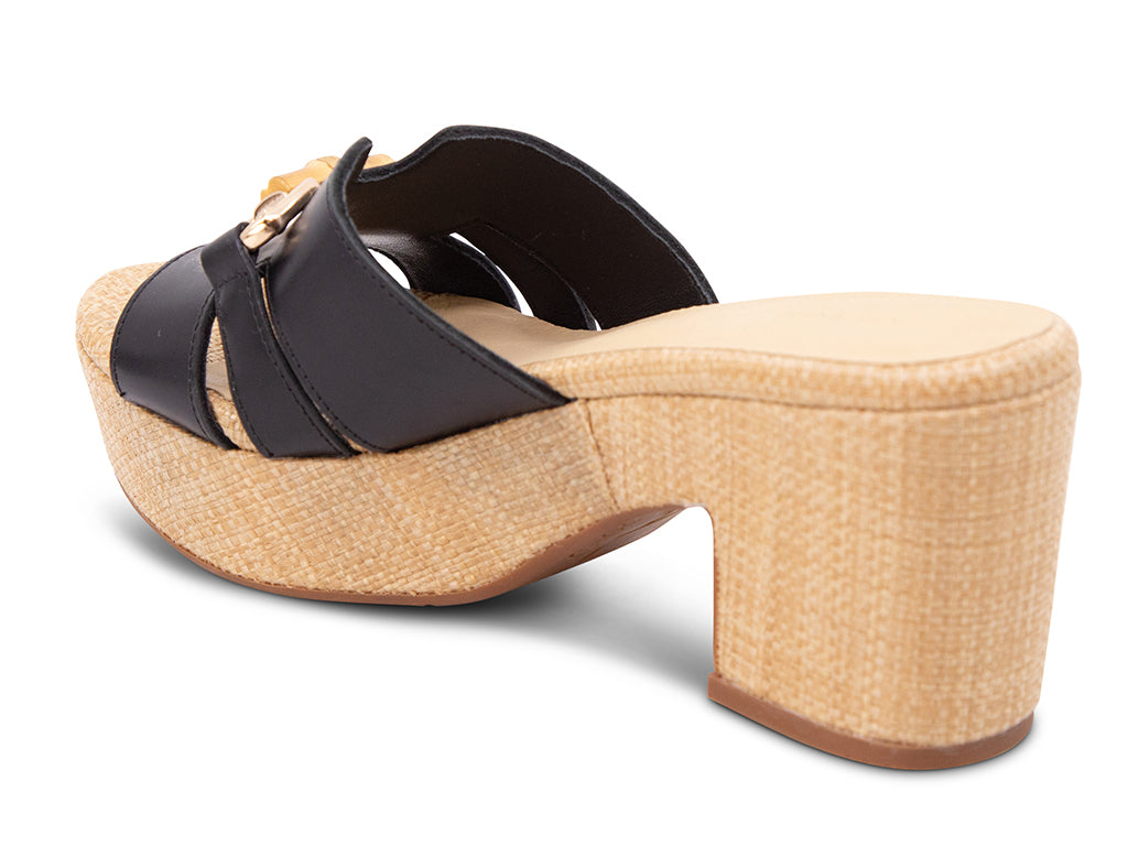 black sandal with bamboo toggle buckle on a raffia wrapped platform and block heel - view from back angle