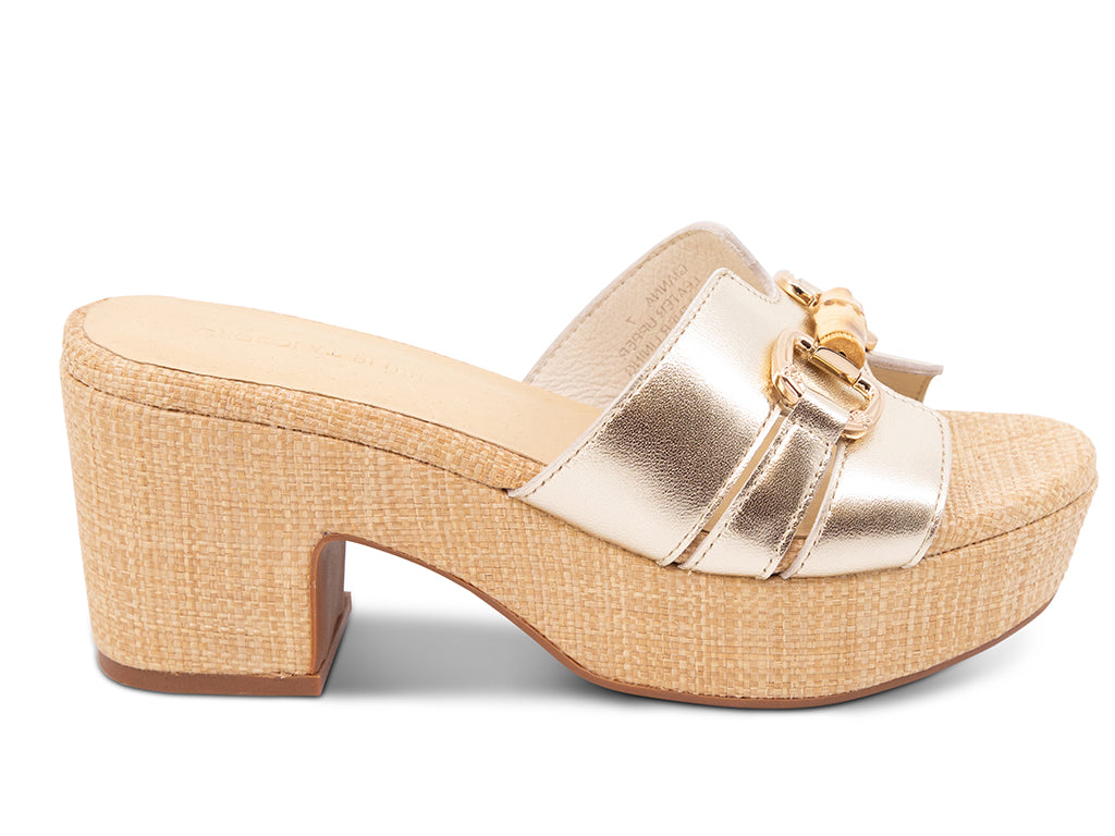 gold metallic sandal with bamboo toggle buckle on a raffia wrapped platform and block heel - side view